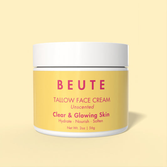 Jar of BEUTE tallow face cream on a light yellow background